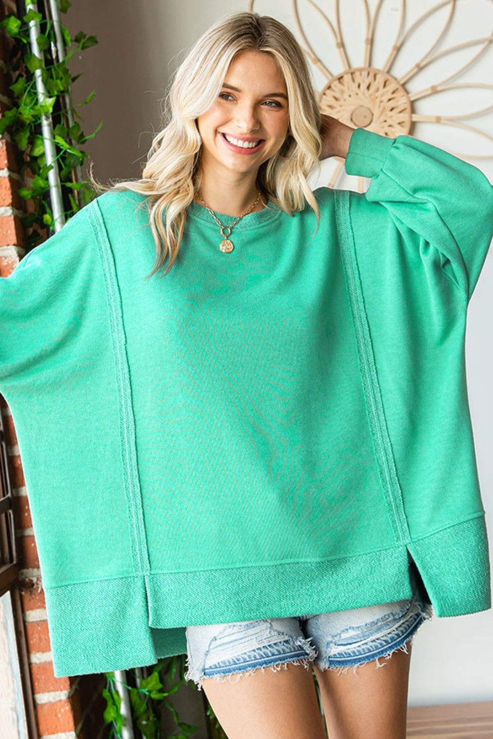 Exposed Seam Round Neck Dropped Shoulder Sweatshirt